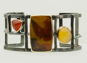 BR-7-Oxidized sterling silver, Agate Orange Chalcedony, Yellow Chalcedony set in 18k gold, 2.50” ht. size 8.