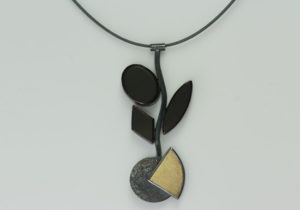 NKL-4- Oxidized silver, 18k gold on silver, 14k gold, peridot black onyx, 18 inch chain, pendant 3.50 inches by 1.50 inches.