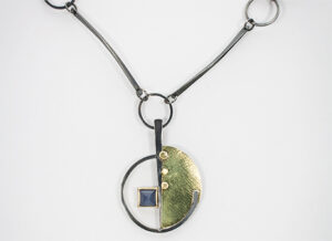 NKL–55: Oxidized sterling silver, 18k gold, Blue Chalcedony, 22” chain. SOLD