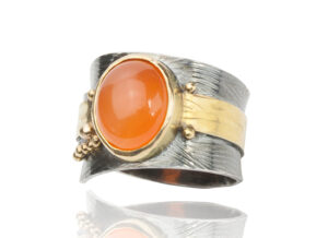 R–21: Carnelian sett in 18k gold, 22k gold fused balls and band on oxidized sterling silver. Size 7.50.