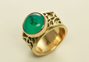 RG–1: 14k, 18k gold, Mexican opal, size 6.5 band ring. Ring shank 7/16th height. SOLD