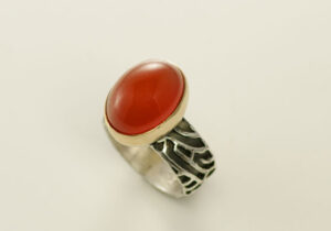 RG-2-Oxidized, polished silver, 18k, carnelian, 7.0 band ring. Ring shank 7/16th height. SOLD