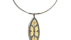 NKL–75:Oxidized sterling silver, 24k gold, tourmaline.Pendant 3"x1", 18" Omega Chain.